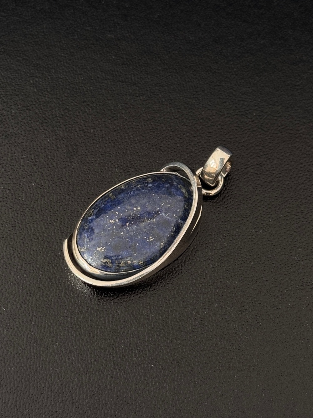 925 Sterling Silver and Lapis‎ Lazuli pendant.